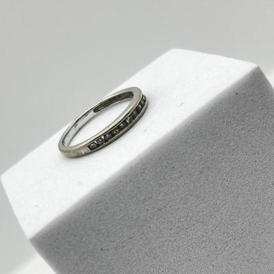 LOT 175J: 18K White Gold Channel Set Diamond Band - Size 7 - 1.7 GTW