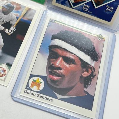 LOT 186J: 1980s/90s Baseball Cards - Manny Ramirez, Derek Jeter, Deion Sanders and More