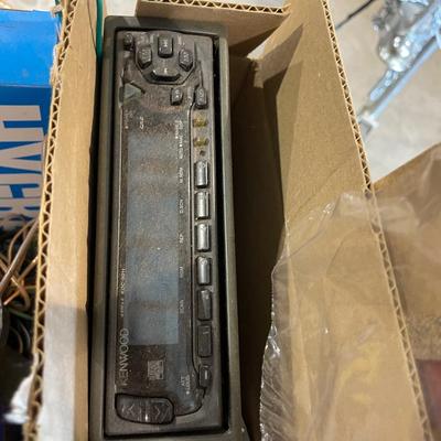 Lot 411 windshield scrapers, oil filters, carburtator repair kit,oversized load sign