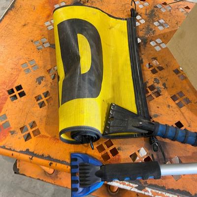 Lot 411 windshield scrapers, oil filters, carburtator repair kit,oversized load sign