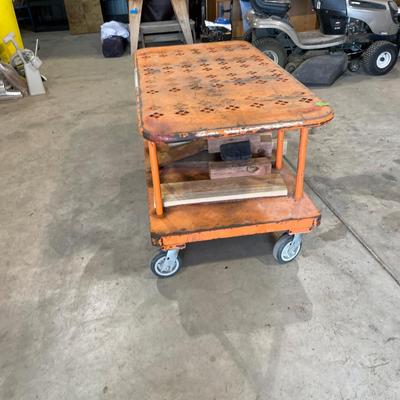 Lot 413 orange wood cart (Looks to be from Home Depot) with wood scraps