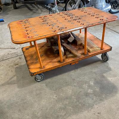 Lot 413 orange wood cart (Looks to be from Home Depot) with wood scraps
