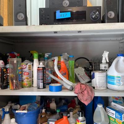 Lot 418 top shelf of metal cabinet with chemicals and liquids