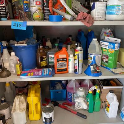 Lot 419 second shelf of metal cabinet with automotive chemicals