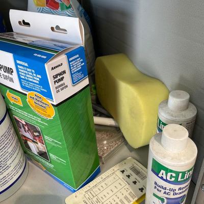 Lot 419 second shelf of metal cabinet with automotive chemicals