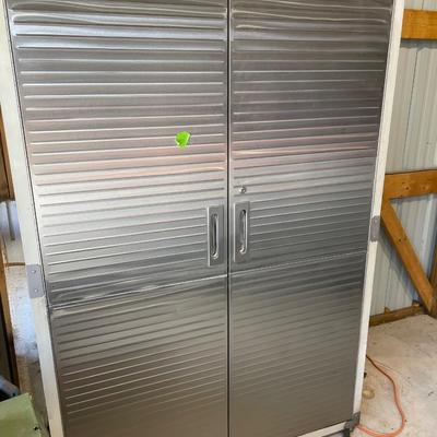 Lot 422 metal cabinet of liquids and chemicals - contents sold separately