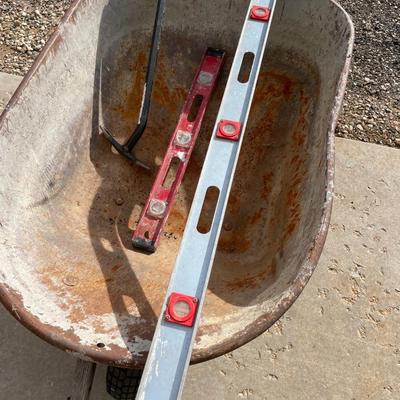 Lot 434 wheelbarrow, crowbars and levels