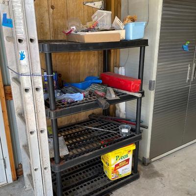 Lot 440 plastic shelf with misc yard items
