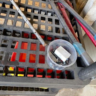 Lot 440 plastic shelf with misc yard items