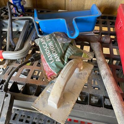 Lot 440 plastic shelf with misc yard items