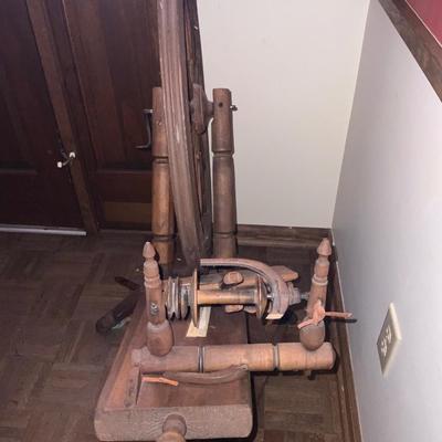 Antique Spinning Wheel. With Jouliere written on the spinning wheel