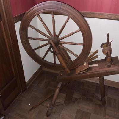 Antique Spinning Wheel. With Jouliere written on the spinning wheel
