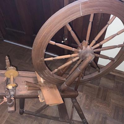 Antique Spinning Wheel. With Jouliere written on the spinning wheel
