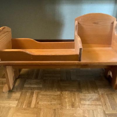 Vintage wooden cradle for toddler and doll. Includes matching nightgown and blanket.
