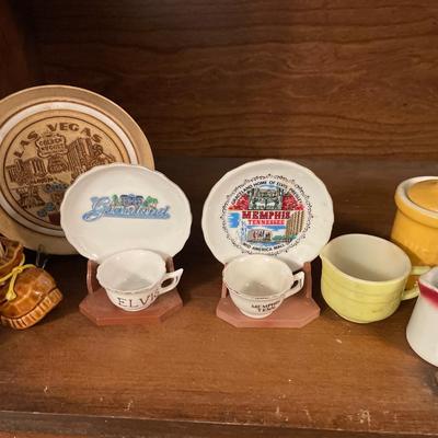 Small plates and cups with mustard jar