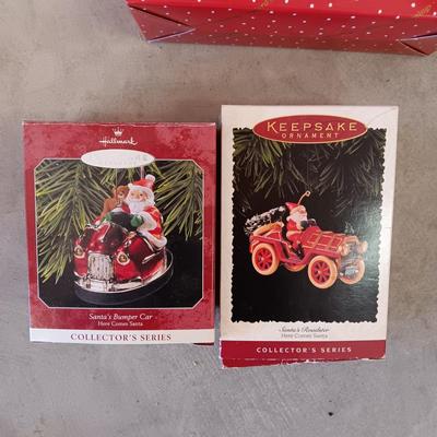 HALLMARK ORNAMENTS W/SANTA IN THE DRIVERS SEAT PLUS SANTAS BOOTS FROM DILLARDS