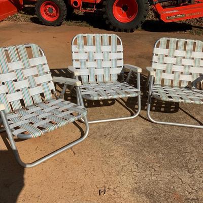 Lot of camping chairs including low chairs for the beach