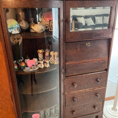 Beautiful curved glass front cabinet