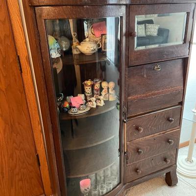 Beautiful curved glass front cabinet