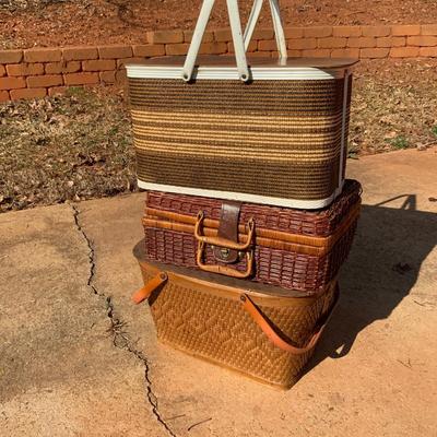 Lot of 3 vintage Wicker picnic baskets including 2 tablecloths.