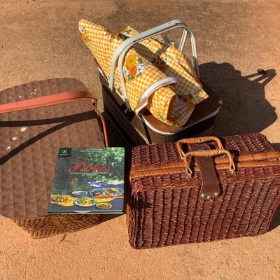 Lot of 3 vintage Wicker picnic baskets including 2 tablecloths.