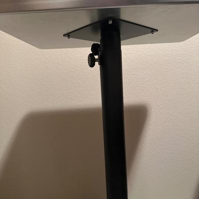 Adjustable metal rolling tray