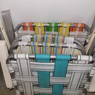 Vintage lightweight patio chairs with repair webbing