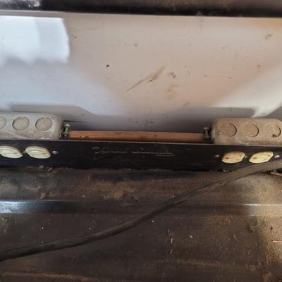 Rolling cabinet filled with tools with electrical receptacles