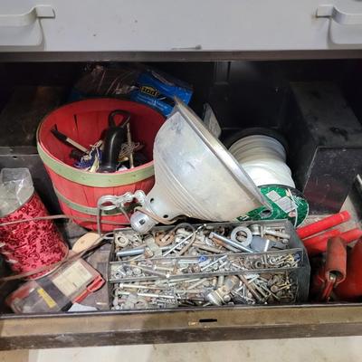 Rolling cabinet filled with tools with electrical receptacles