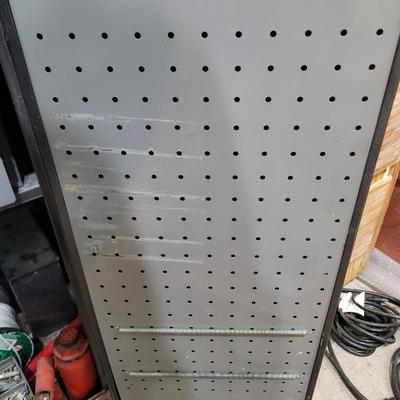 Rolling cabinet filled with tools with electrical receptacles