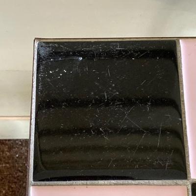 LOT 230: MCM Black and Pink Tile and Metal Plant Stand / Table with Pink Decor