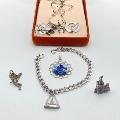 LOT 238: Sterling Silver / Silver Tone Jewelry Charm Collection - Mickey Mouse, Tinkerbell and More