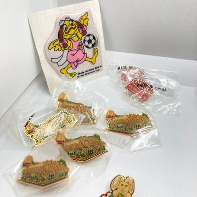 LOT 242: Large Vintage McDonald's Memorabilia Collection - Ronald McDonald Watch in Package, Pins, Stickers, Magnetics,