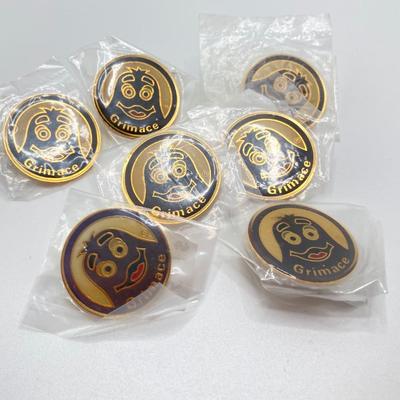 LOT 242: Large Vintage McDonald's Memorabilia Collection - Ronald McDonald Watch in Package, Pins, Stickers, Magnetics,