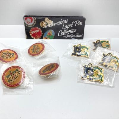 LOT 242: Large Vintage McDonald's Memorabilia Collection - Ronald McDonald Watch in Package, Pins, Stickers, Magnetics,