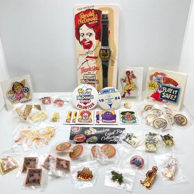 LOT 242: Large Vintage McDonald's Memorabilia Collection - Ronald McDonald Watch in Package, Pins, Stickers, Magnetics,