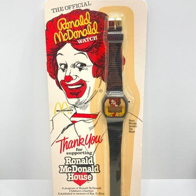 LOT 242: Large Vintage McDonald's Memorabilia Collection - Ronald McDonald Watch in Package, Pins, Stickers, Magnetics,