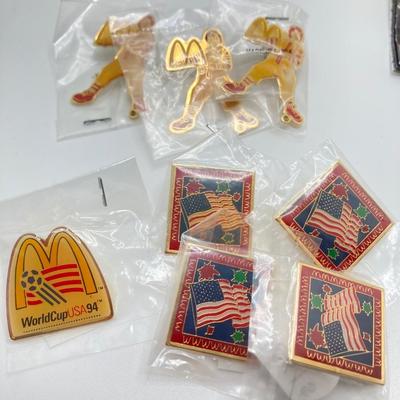 LOT 242: Large Vintage McDonald's Memorabilia Collection - Ronald McDonald Watch in Package, Pins, Stickers, Magnetics,