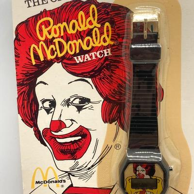 LOT 242: Large Vintage McDonald's Memorabilia Collection - Ronald McDonald Watch in Package, Pins, Stickers, Magnetics,