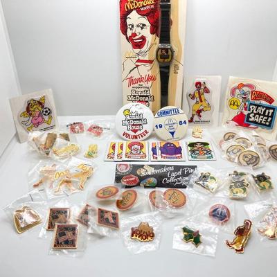 LOT 242: Large Vintage McDonald's Memorabilia Collection - Ronald McDonald Watch in Package, Pins, Stickers, Magnetics,