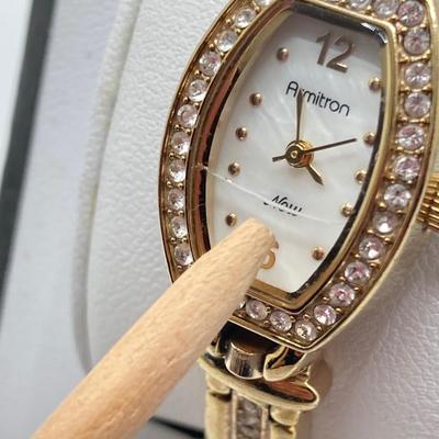 LOT 243: Timex and Armitron Watches