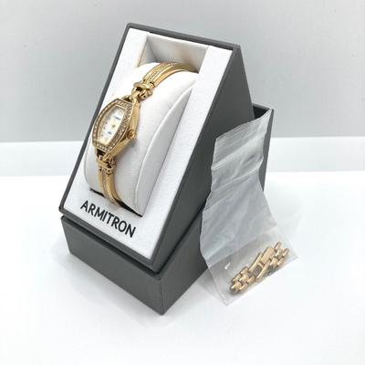 LOT 243: Timex and Armitron Watches