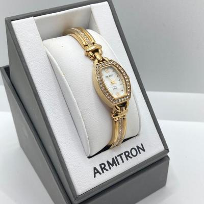 LOT 243: Timex and Armitron Watches