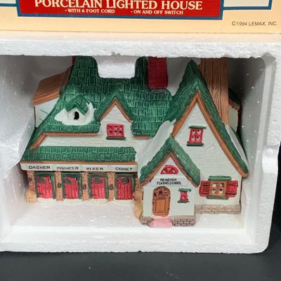 LOT 254:Large Assortment of Lemax Hearthside Village Houses and Figurines