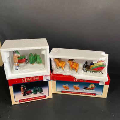 LOT 254:Large Assortment of Lemax Hearthside Village Houses and Figurines