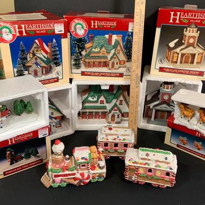 LOT 254:Large Assortment of Lemax Hearthside Village Houses and Figurines