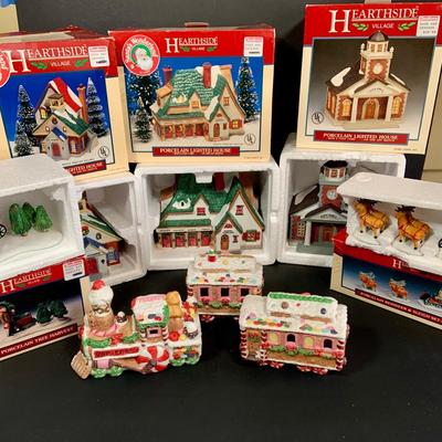 LOT 254:Large Assortment of Lemax Hearthside Village Houses and Figurines