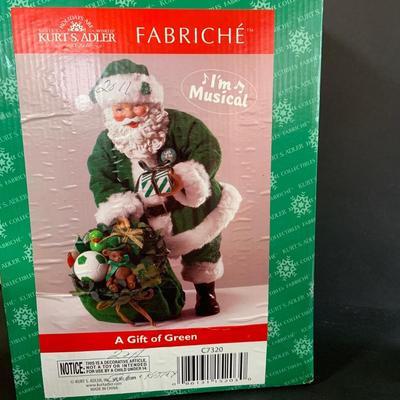 LOT 255: Kurt Adler Green Irish Santa Caus and 2 Santas