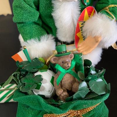 LOT 255: Kurt Adler Green Irish Santa Caus and 2 Santas