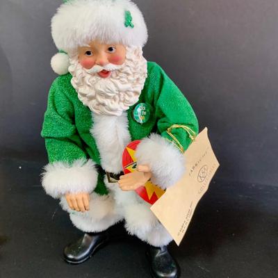 LOT 255: Kurt Adler Green Irish Santa Caus and 2 Santas
